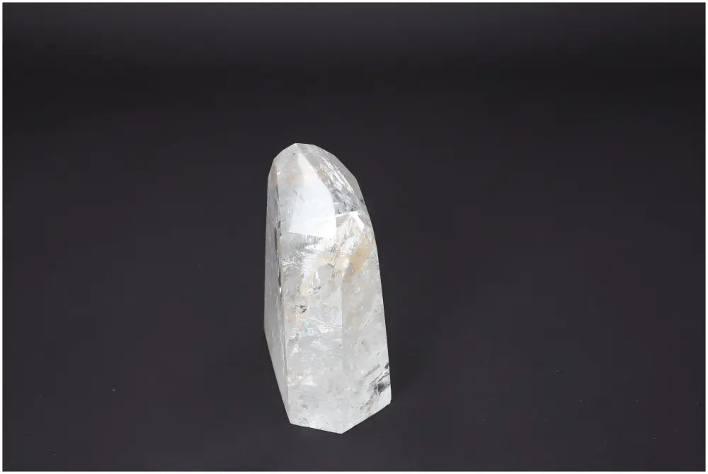 Clear Lemurian Quartz Obelisk for chakra and zodiac alignment, showcasing unique spiritual and energetic properties for body and soul.