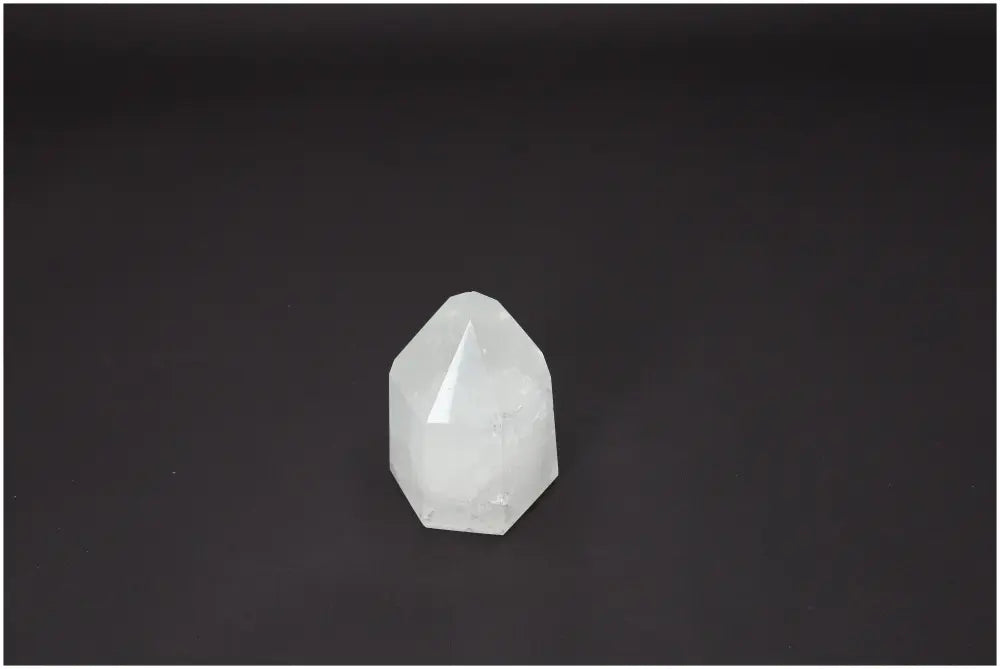 Lemurian Quartz Obelisk, a crystal known for supporting chakras and zodiac signs, enhancing energetic and spiritual balance.