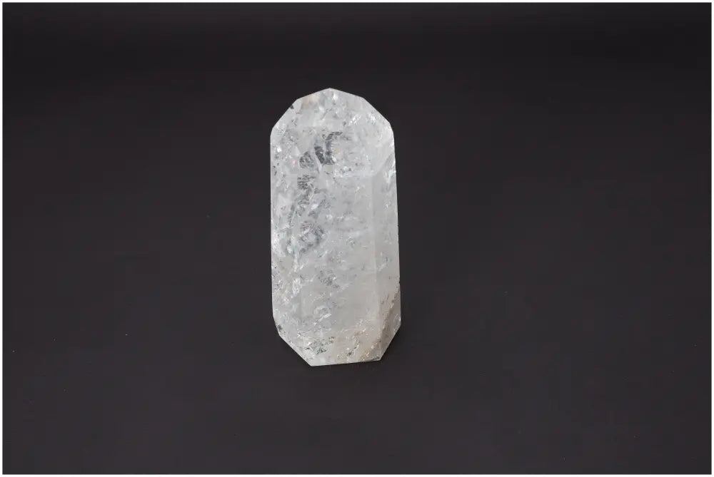 Lemurian Quartz Obelisk against black background showcasing unique properties and spiritual connections.