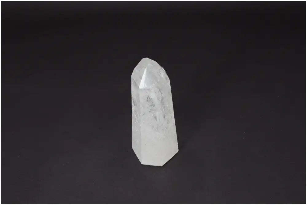 Lemurian Quartz Obelisk on dark background, symbolizing clarity, balance, and personal growth, known as the Master Healer.