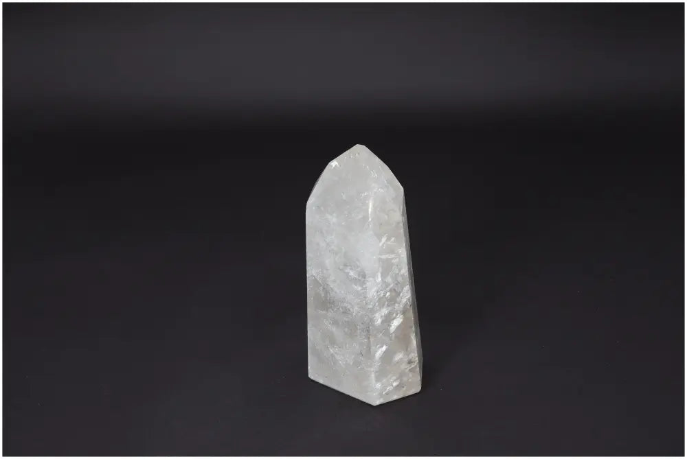 Lemurian Quartz Obelisk crystal on dark background, symbolizing clarity, balance, and personal growth. Ethically sourced and naturally formed.