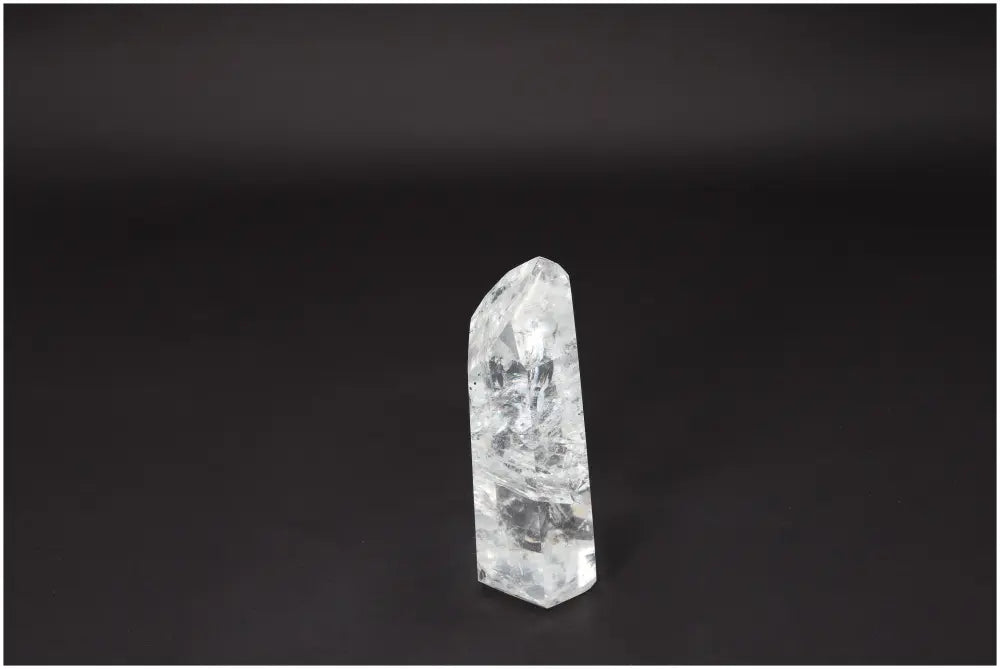 Lemurian Quartz Obelisk - Clear Quartz crystal for clarity and balance on a black background, ethically sourced and hand-selected.