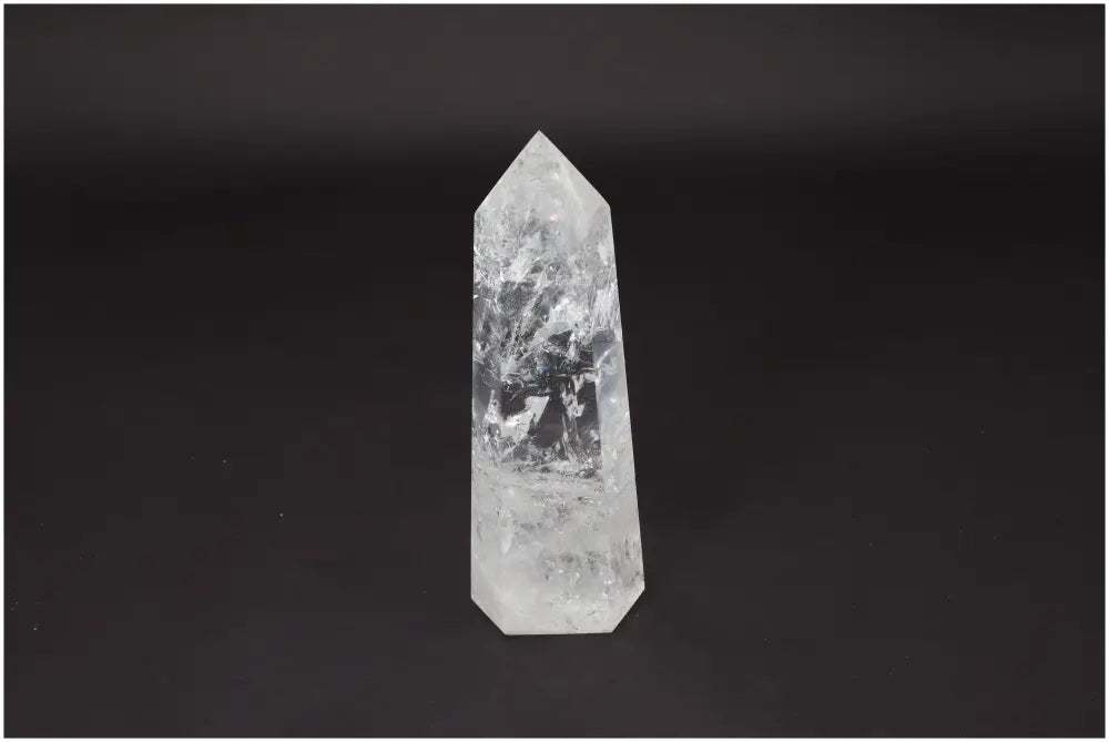 Lemurian Quartz Obelisk - Clear Quartz crystal for clarity, balance, and healing energy on a black background.