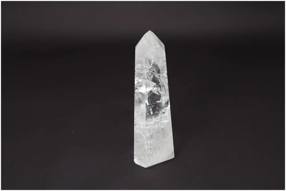 Lemurian Quartz Obelisk crystal with clear finish for clarity and balance, ethically sourced and hand-selected for personal growth.