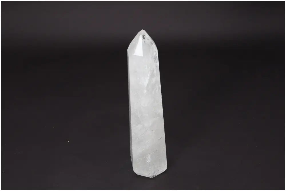 Lemurian Quartz Obelisk crystal for clarity and healing on black background