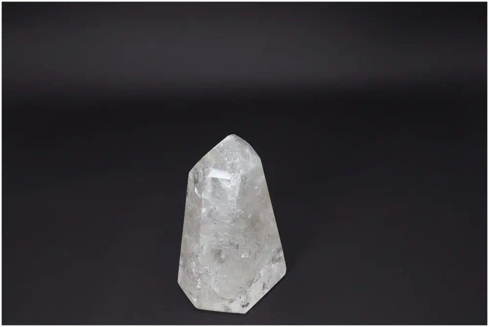 Lemurian Clear Quartz Obelisk for clarity, balance, and personal growth on black background
