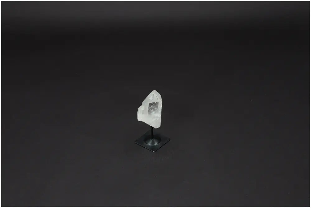 Lemurian Quartz crystal on a metal stand, ideal for enhancing clarity and balance, known as the "Master Healer" in crystals.