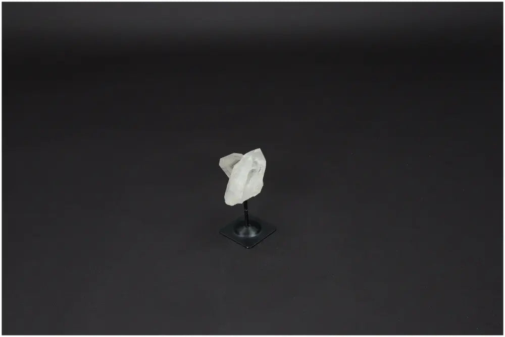 Lemurian Quartz on metal stand for harmonizing energy, purifying environment, and absorbing negative vibrations, ideal for daily use.