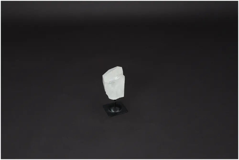 Lemurian Quartz on metal stand, clear quartz crystal for purification, harmonizing energy, and neutralizing negative vibrations.