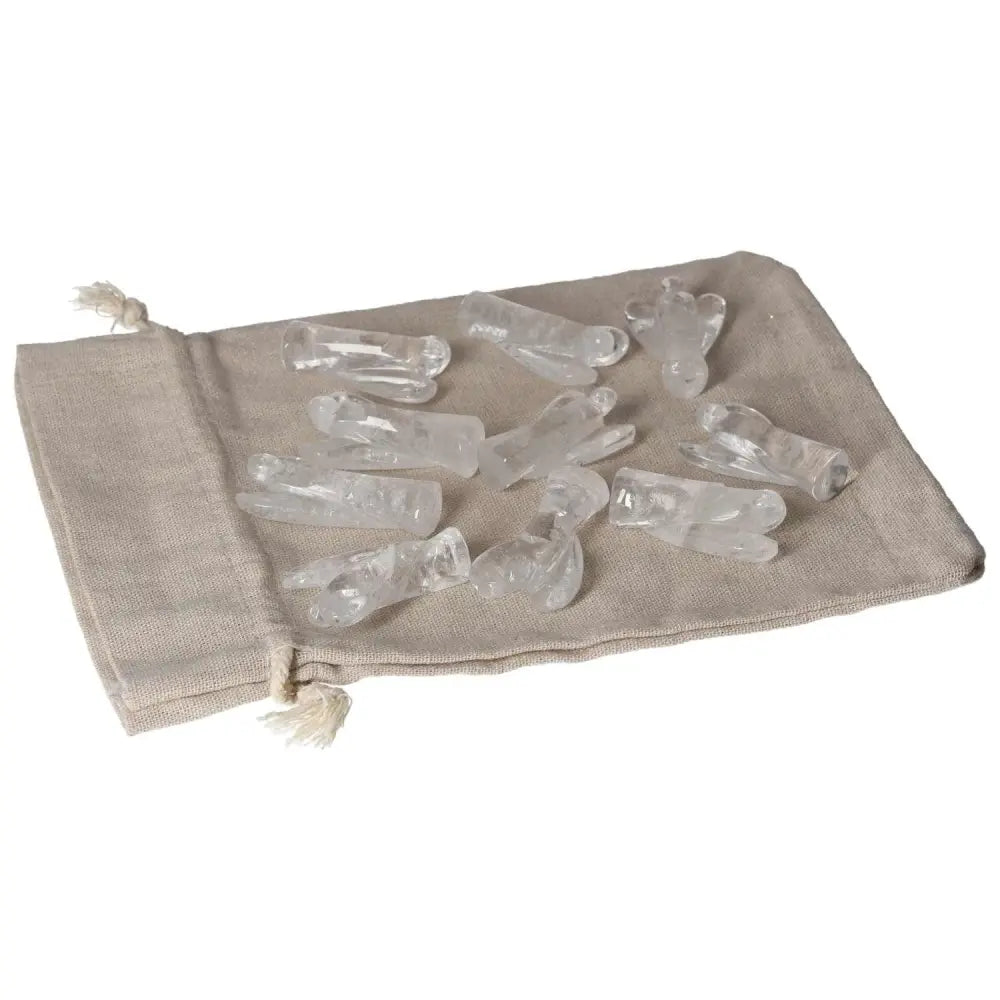 Clear Quartz Lemurian Small Angels on fabric pouch, ideal for purification and harmonizing energy, dispelling negativity.