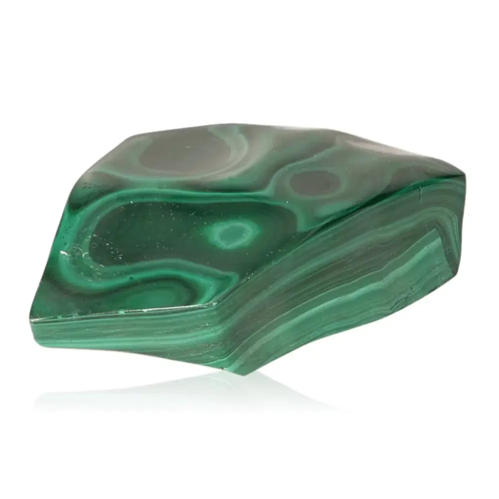 Malachite gemstone showcasing its natural elegance and soothing energy, known for alleviating depression and instilling hope.