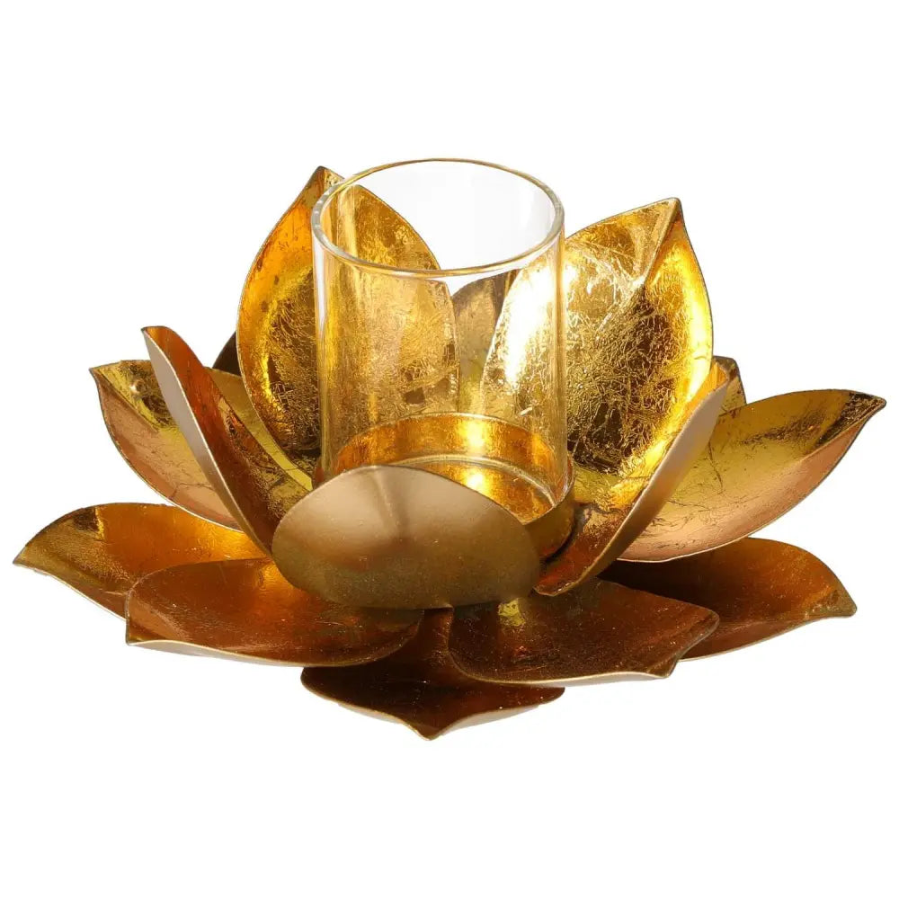 Elegant golden metal lotus candle holder with glass insert, inspired by floral geometry and adding luxury to any space.
