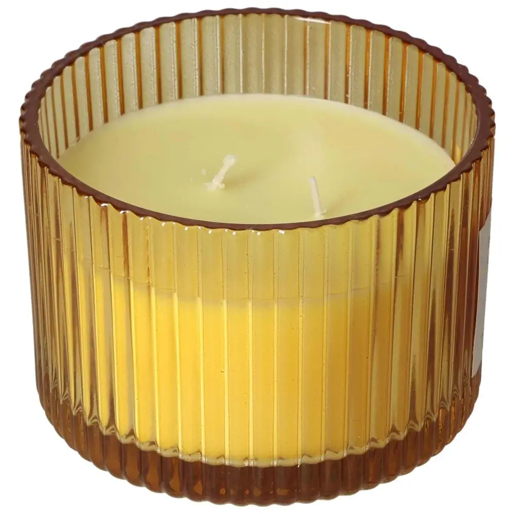 Patchouli Amber Scented Candle in ribbed amber glass jar, made with natural soy wax for a luxurious eco-friendly burn. Ideal for conscious living.