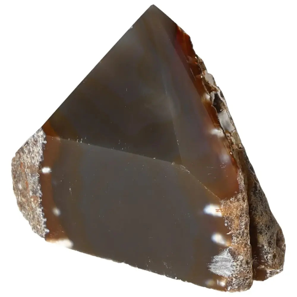 Polished Agate Point gemstone from Sylvia Crystals, showcasing its smooth, serene finish and harmonizing properties.