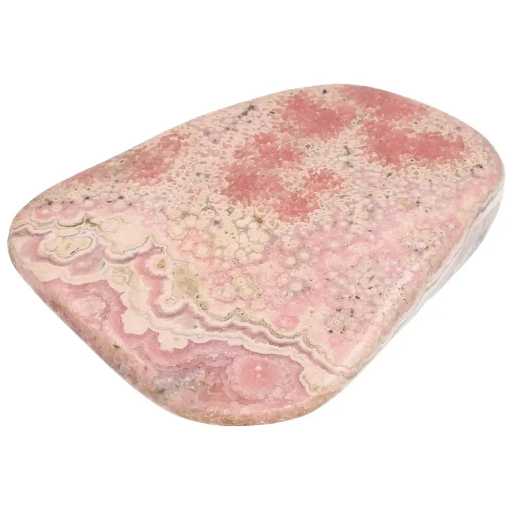 Polished Rhodochrosite with vibrant pink shades and intricate banding by Sylvia Crystals, symbolizing love and compassion.