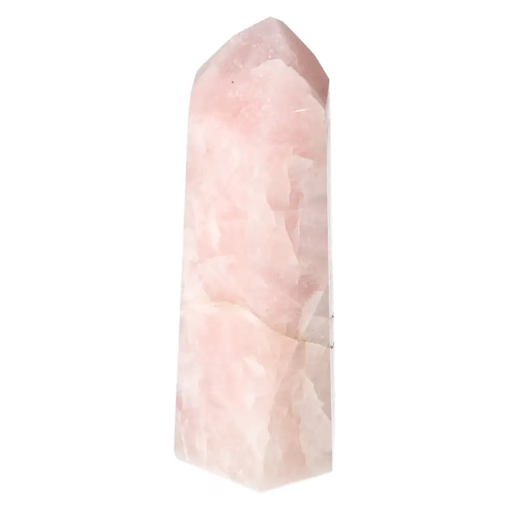 Polished Rose Quartz Obelisk by Sylvia Crystals, showcasing elegant pink hues and spiritual energy, perfect for enhancing any space.