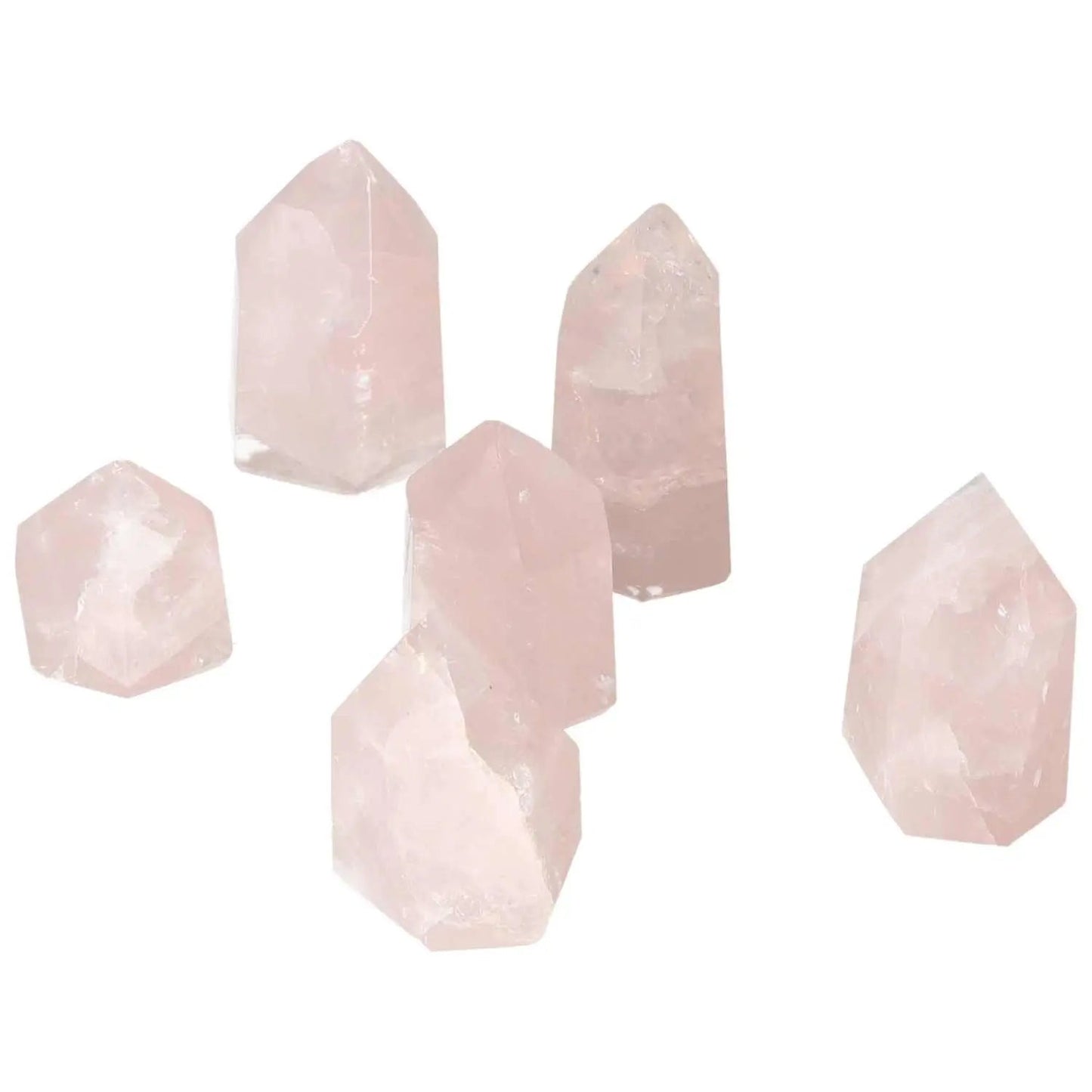 Collection of Polished Rose Quartz Obelisks XS, enhancing space with elegance and natural allure from Sylvia Crystals.