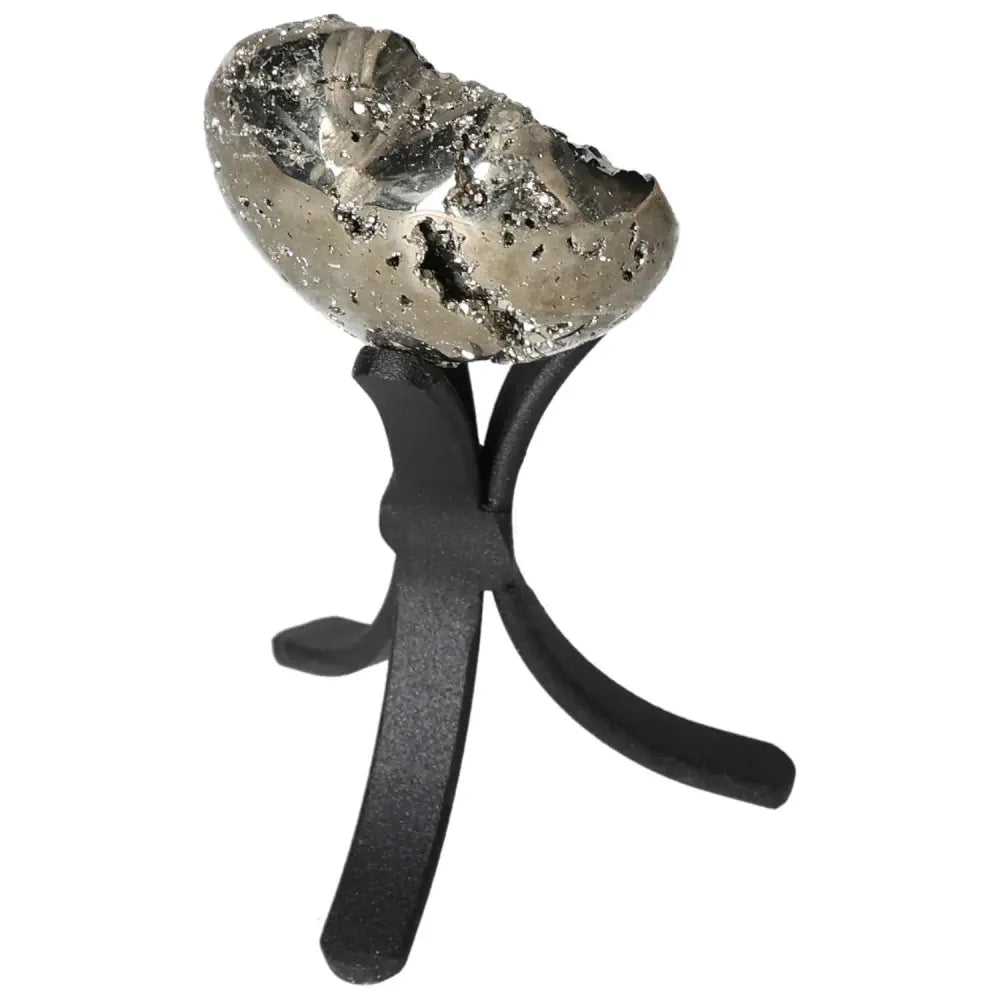 Polished pyrite heart shape on stand, showcasing golden luster and grounding energy, ideal for enhancing space and energy.