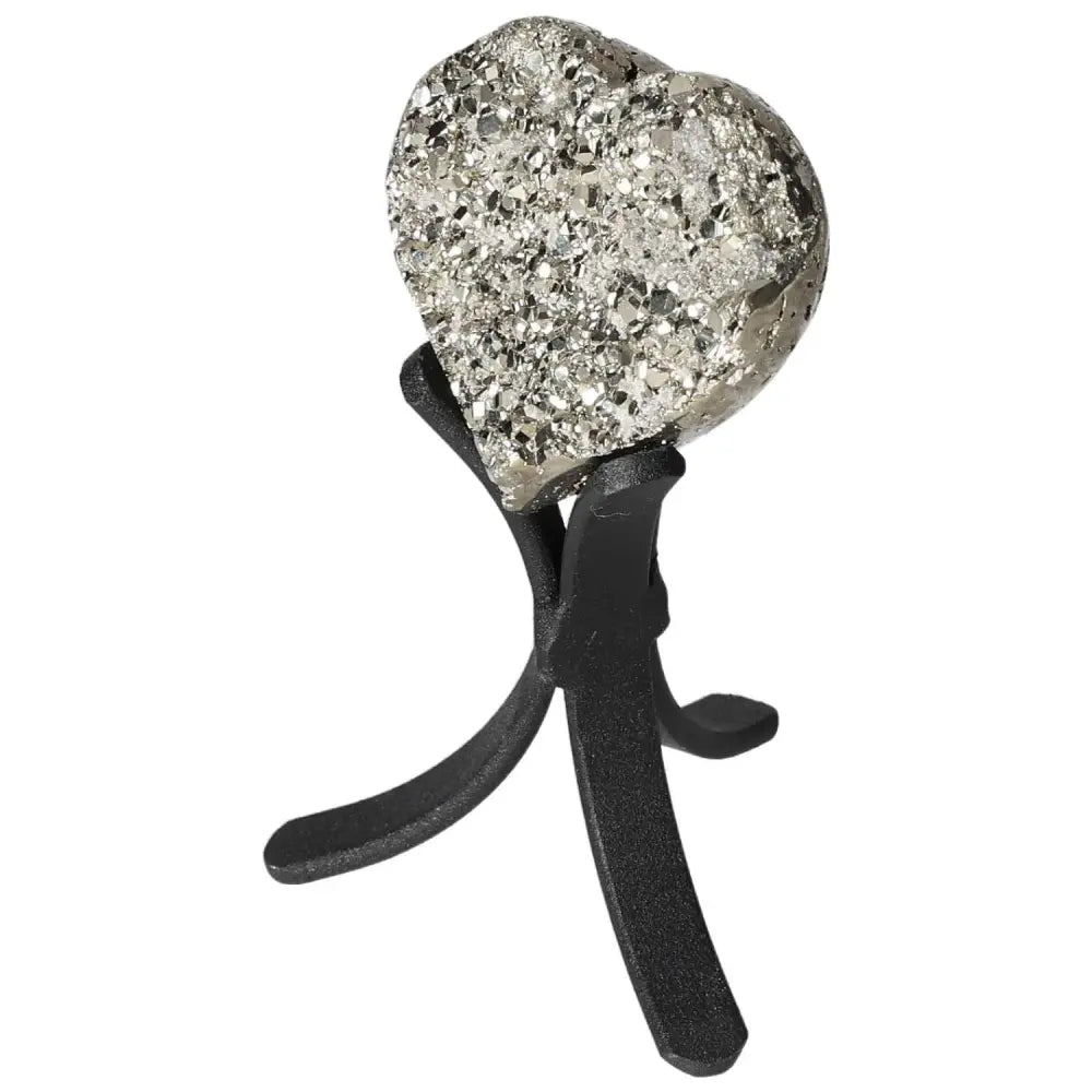 Polished pyrite heart on stand, showcasing its golden luster and grounding energy, perfect for elevating your space.