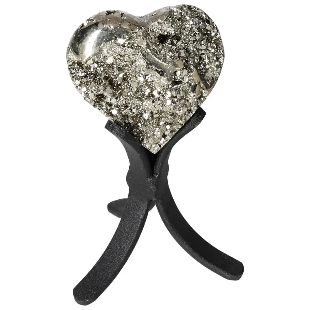 Polished pyrite heart on a stand showcasing golden luster and grounding properties, perfect for enhancing home decor and energy.