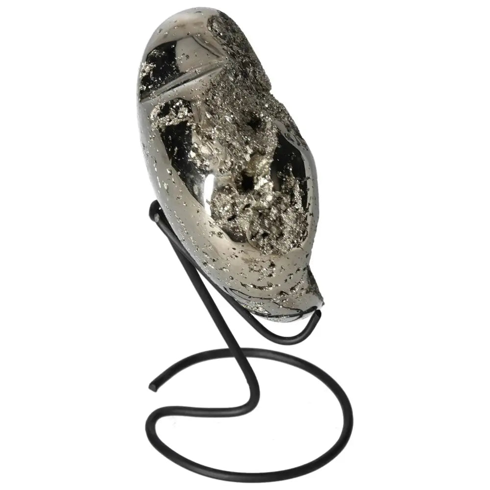 Polished pyrite heart on stand showcasing golden luster and grounding energy, perfect for home decor and spiritual enhancement.