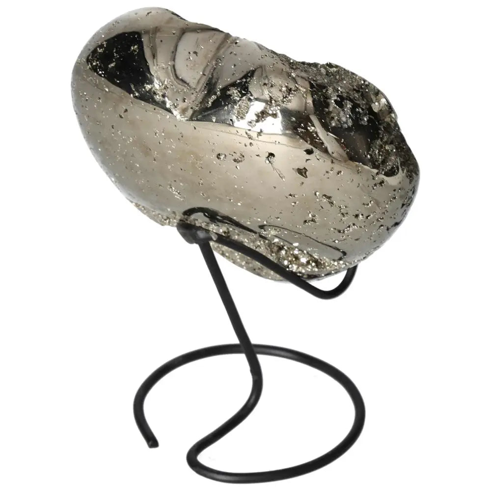 Polished pyrite heart on stand, showcasing its golden luster and grounding energy.