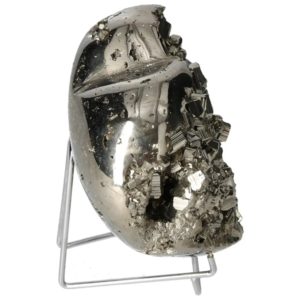 Polished pyrite heart-shaped sculpture with golden luster showcasing expert craftsmanship and radiant energy qualities.