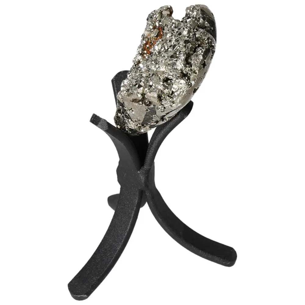 Polished pyrite heart on stand showcasing its golden luster and grounding energy, ideal for enhancing space with radiant energy.