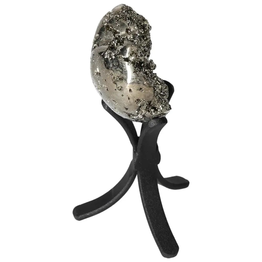 Polished pyrite heart on stand showcasing golden luster and grounding energy, ideal for enhancing space and energy flow.