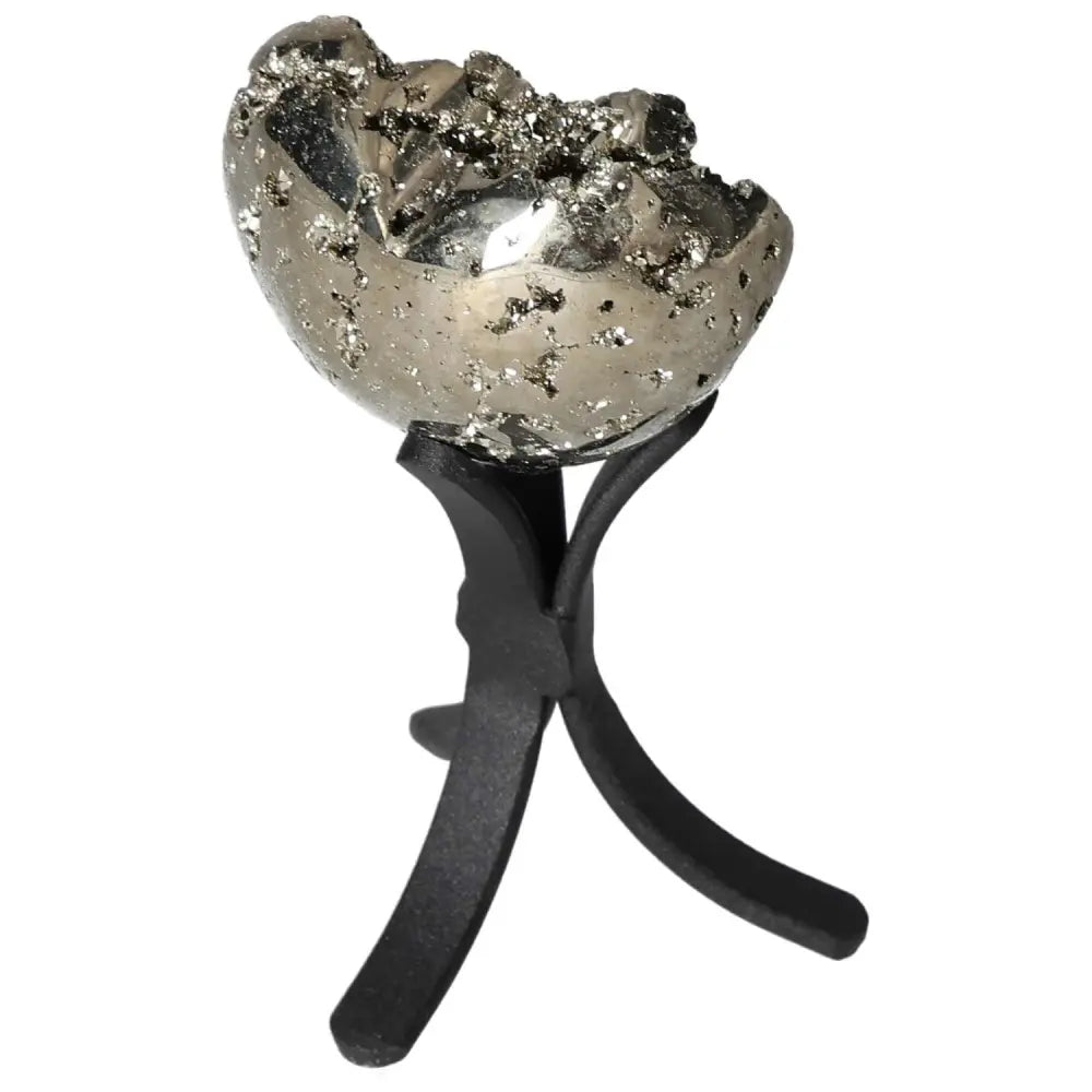 Shiny pyrite sphere on black stand showcasing its metallic luster and natural formations.