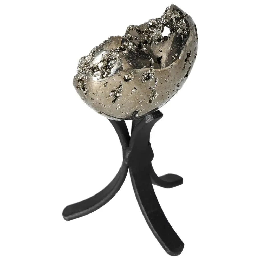 Polished pyrite egg on black stand, showcasing its natural metallic luster and grounding energy.