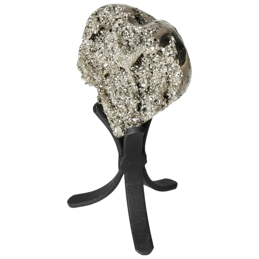 Polished pyrite heart shape with golden luster on a black stand, showcasing radiant energy and grounding power.