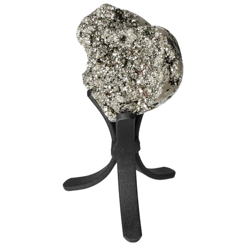 Polished pyrite heart on stand showcasing its radiant golden luster and grounding energy, perfect for enhancing space and décor.