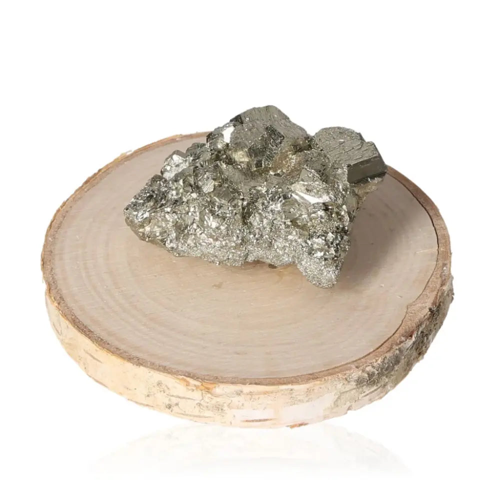 Pyrite druze on a wooden base, showcasing its radiant golden hue and metallic luster, known as "Fool's Gold" for its resemblance to real gold.