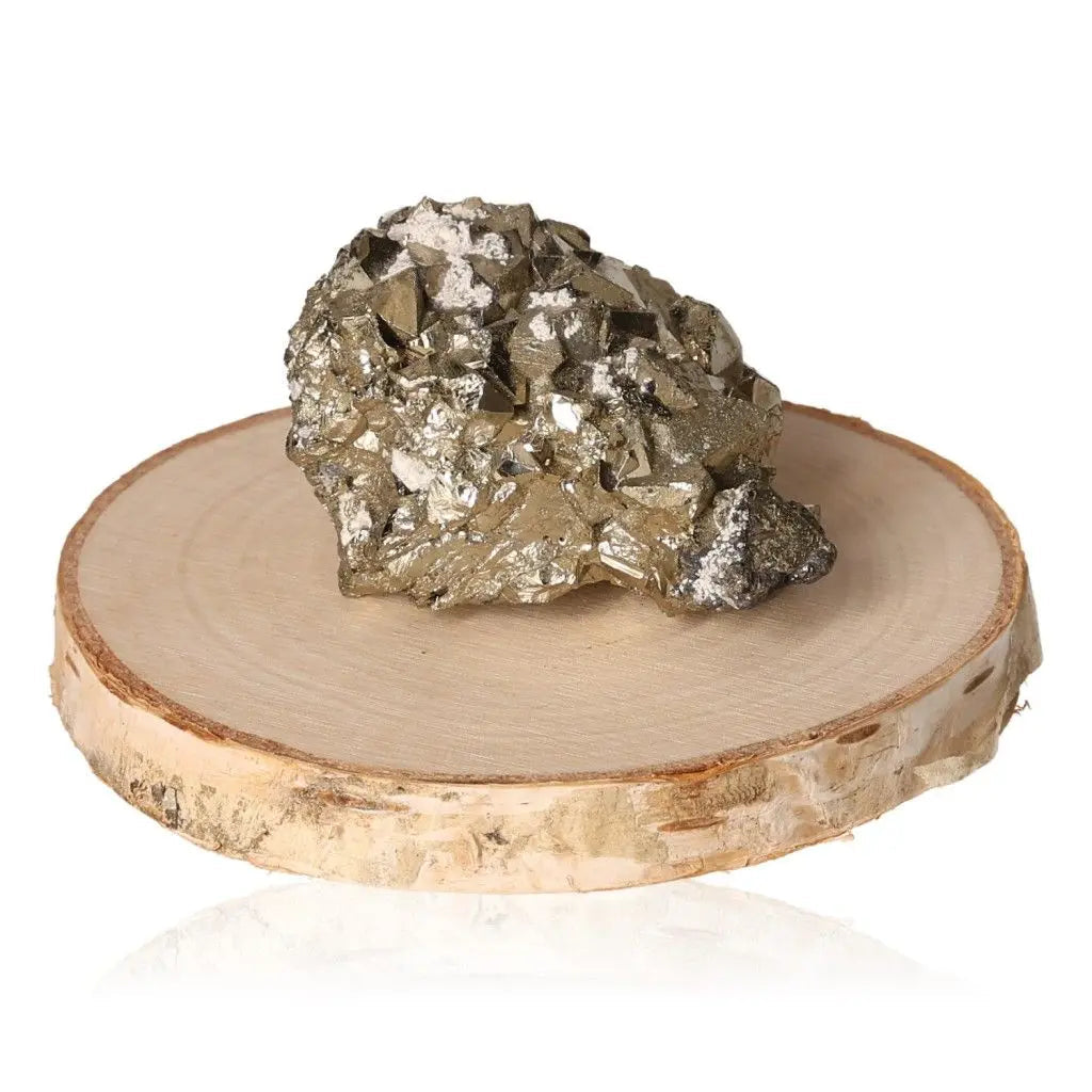 Pyrite druze on wooden base, showcasing its golden hue and metallic luster, symbolizing abundance and prosperity.