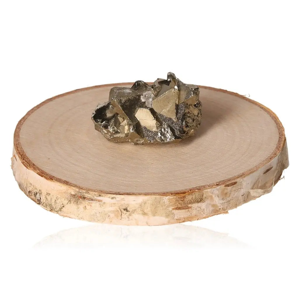 Pyrite druze crystal with metallic luster on wooden disc, symbolizing abundance and prosperity, resembling "Fool's Gold."