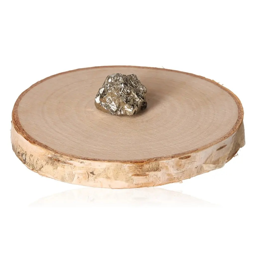 Pyrite druze on a wooden stand showcasing its golden hue and metallic luster, symbolizing wealth and prosperity, often called Fool's Gold.
