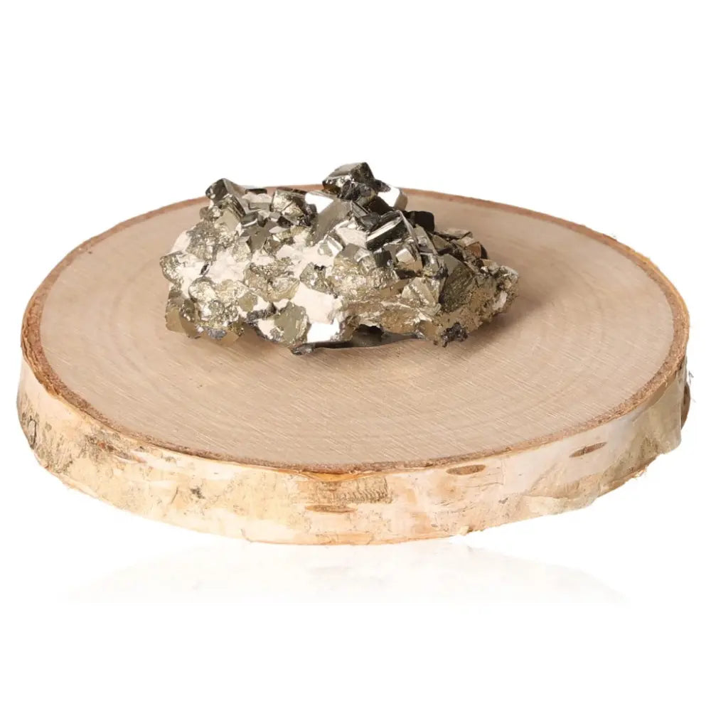 Close-up of radiant golden pyrite druze on wooden base, showcasing its metallic luster and resemblance to "Fool's Gold."