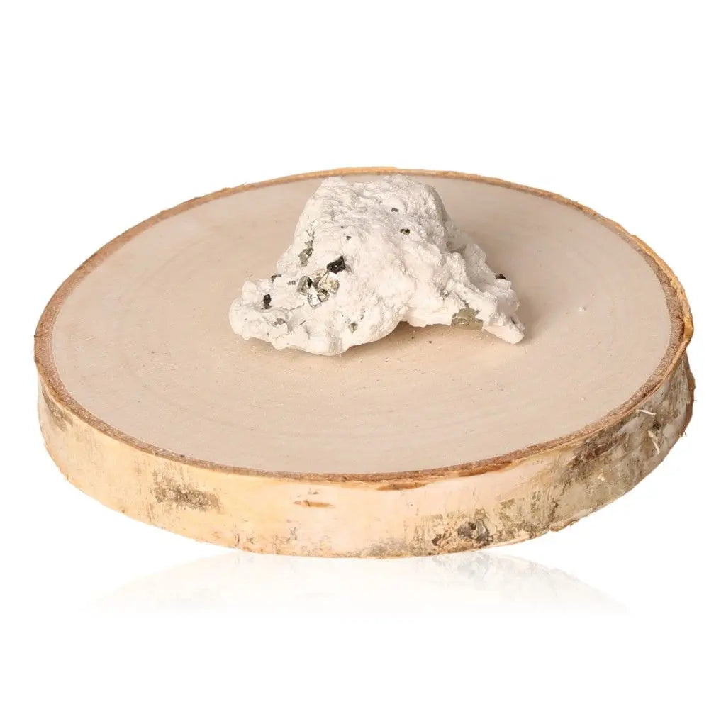 Pyrite druzy mineral on wooden base, showcasing radiant golden hue and metallic luster, symbolizing abundance and prosperity.