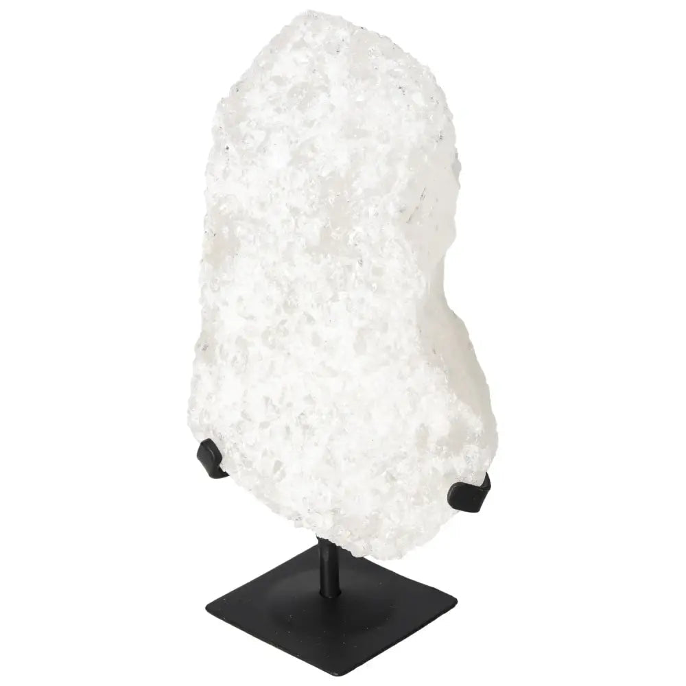 Quartz Crystal Bubble from Sylvia Crystals on stand, showcasing natural inclusions and unique colors for spiritual and personal growth.