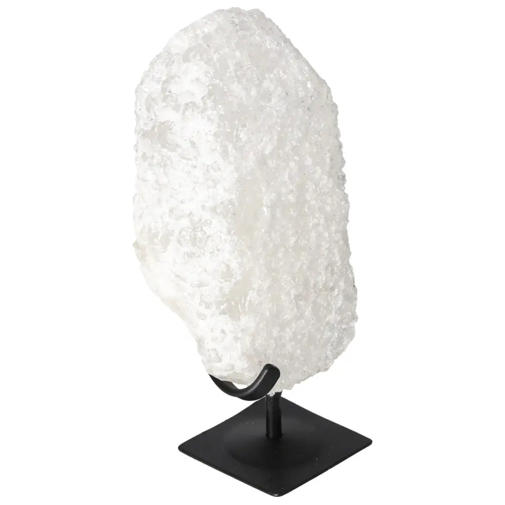 Quartz Crystal Bubble on black stand, a premium gem by Sylvia Crystals for personal and metaphysical growth with unique colors and inclusions.