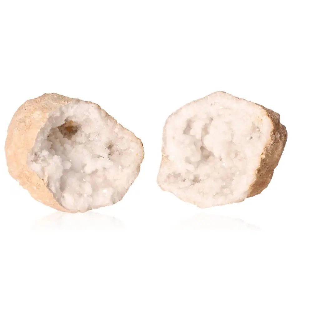 Quartz Geode with rugged exterior and exposed cloudy white crystals, weighing 1200-2000g, radiates purifying and amplifying energy.