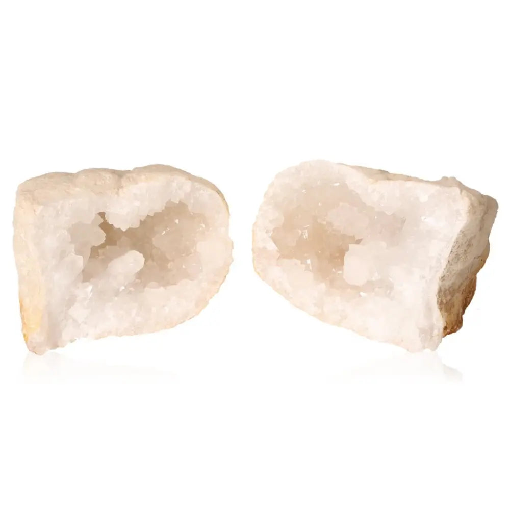 Open quartz geode revealing sparkling cloudy white crystals, perfect for energy purification and amplification.