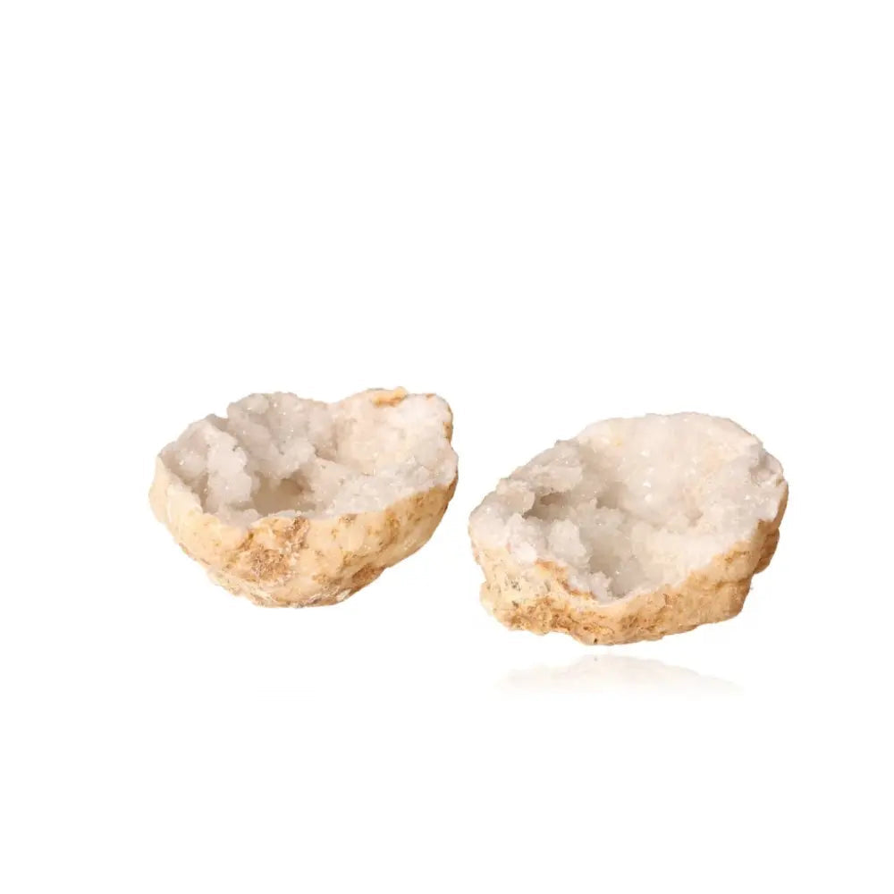 Quartz Geode open to reveal milky white crystals, showcasing its natural beauty and unique characteristics. Weighs 900-1200g.