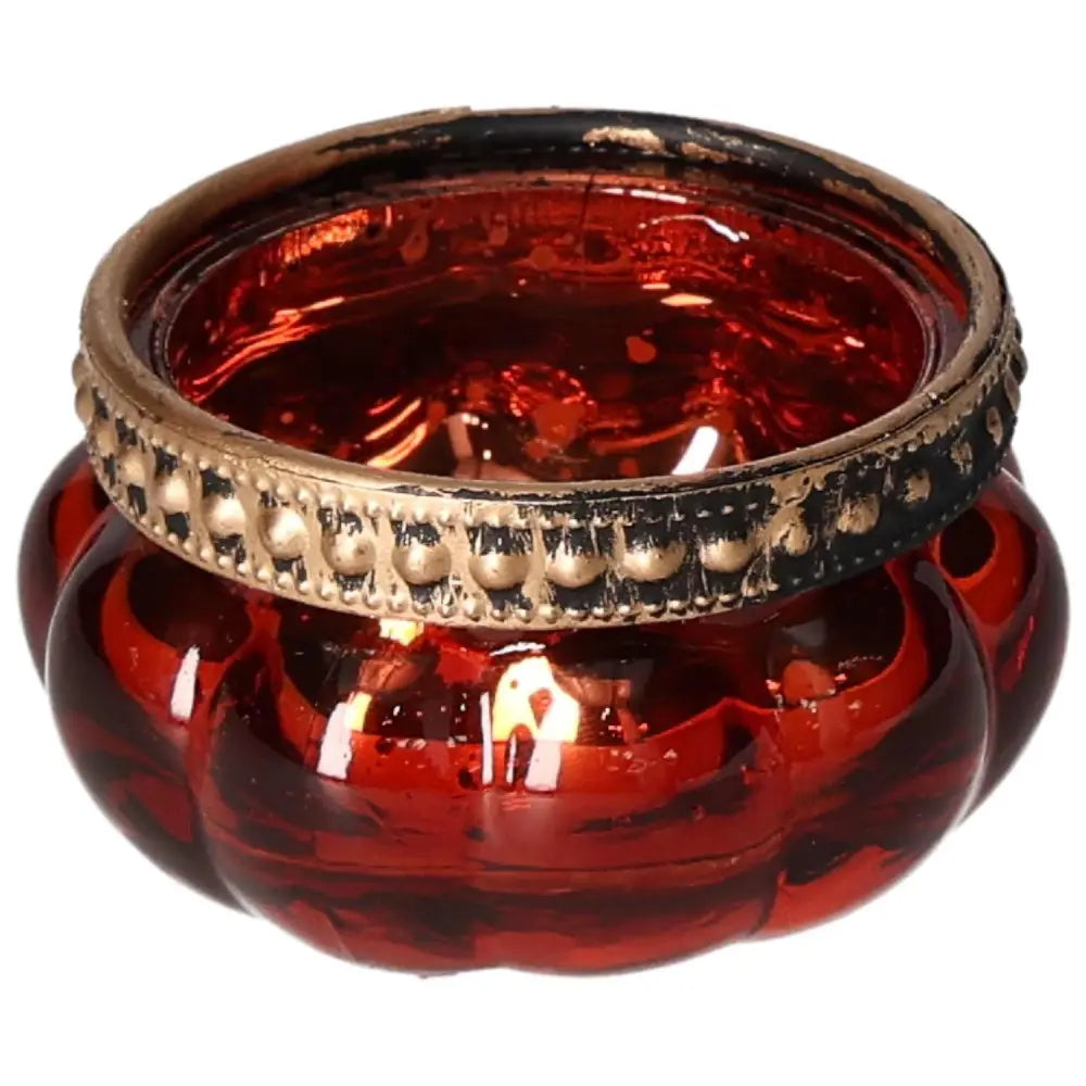Luxurious red candle holder with ornate gold rim, enhancing aesthetic appeal and spiritual energy from Sylvia Crystals.