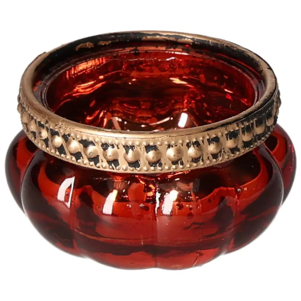 Vibrant red candle holder with gold accents, offering luxury and elegance from Sylvia Crystals. Ideal for conscious living spaces.
