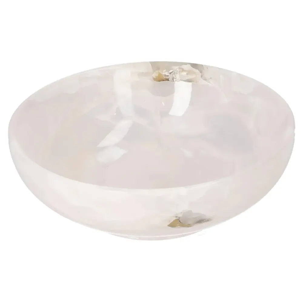 Elegant rose onyx bowl with smooth polished surface and unique natural veining, adding a sophisticated touch to any decor.