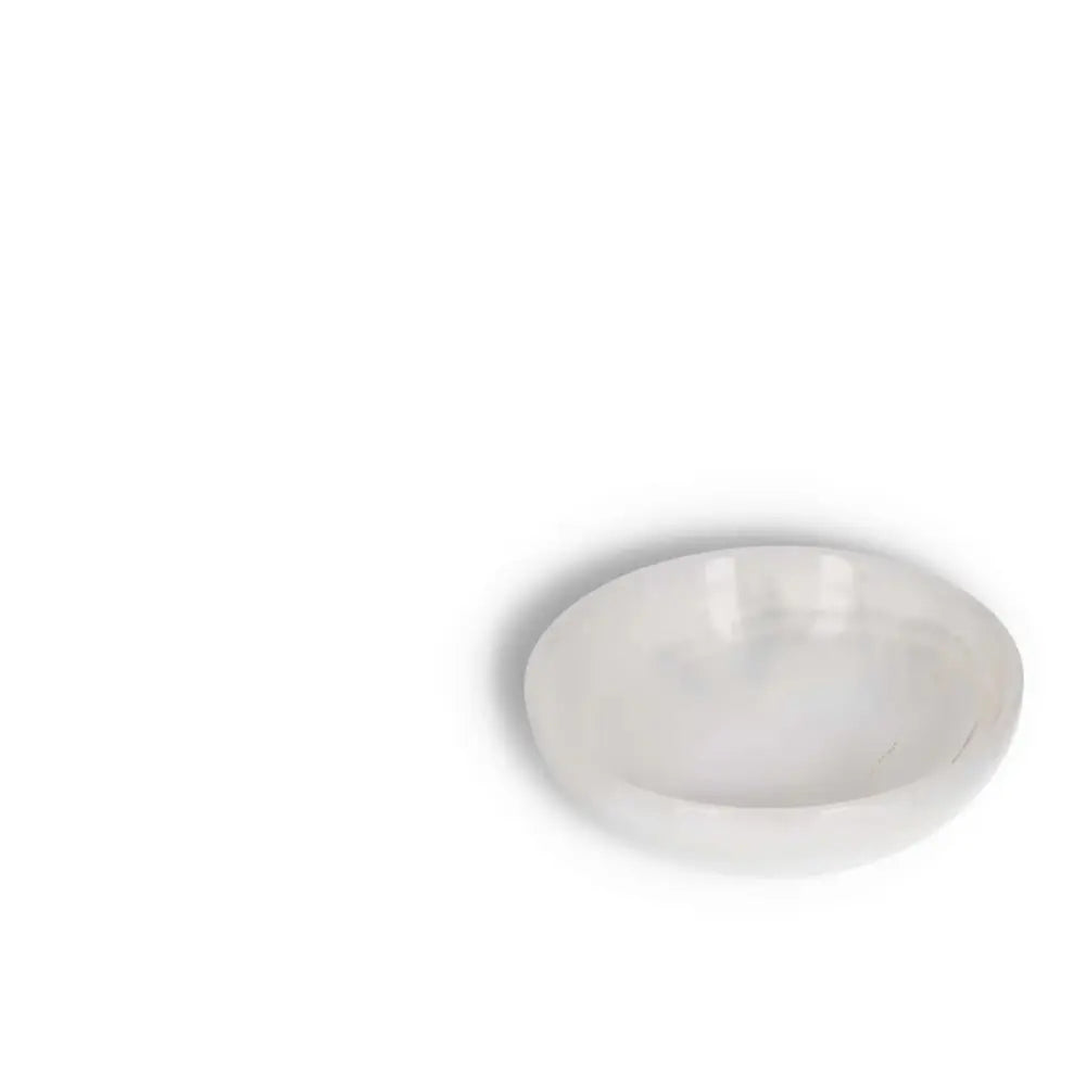 Rose Onyx Bowl with delicate veining, showcasing natural color variations and a polished, translucent finish ideal for elegant home décor.