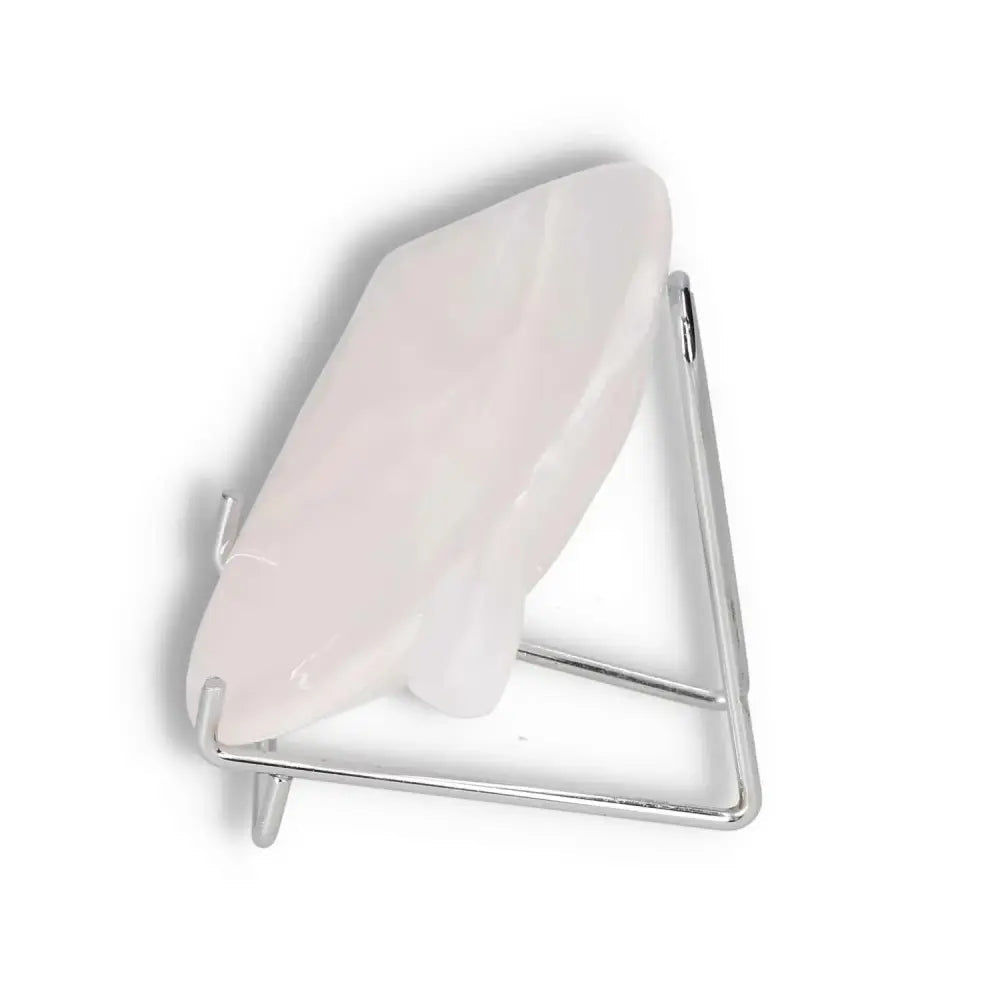 Rose Onyx Platter with unique veining and polished surface on a metal display stand.