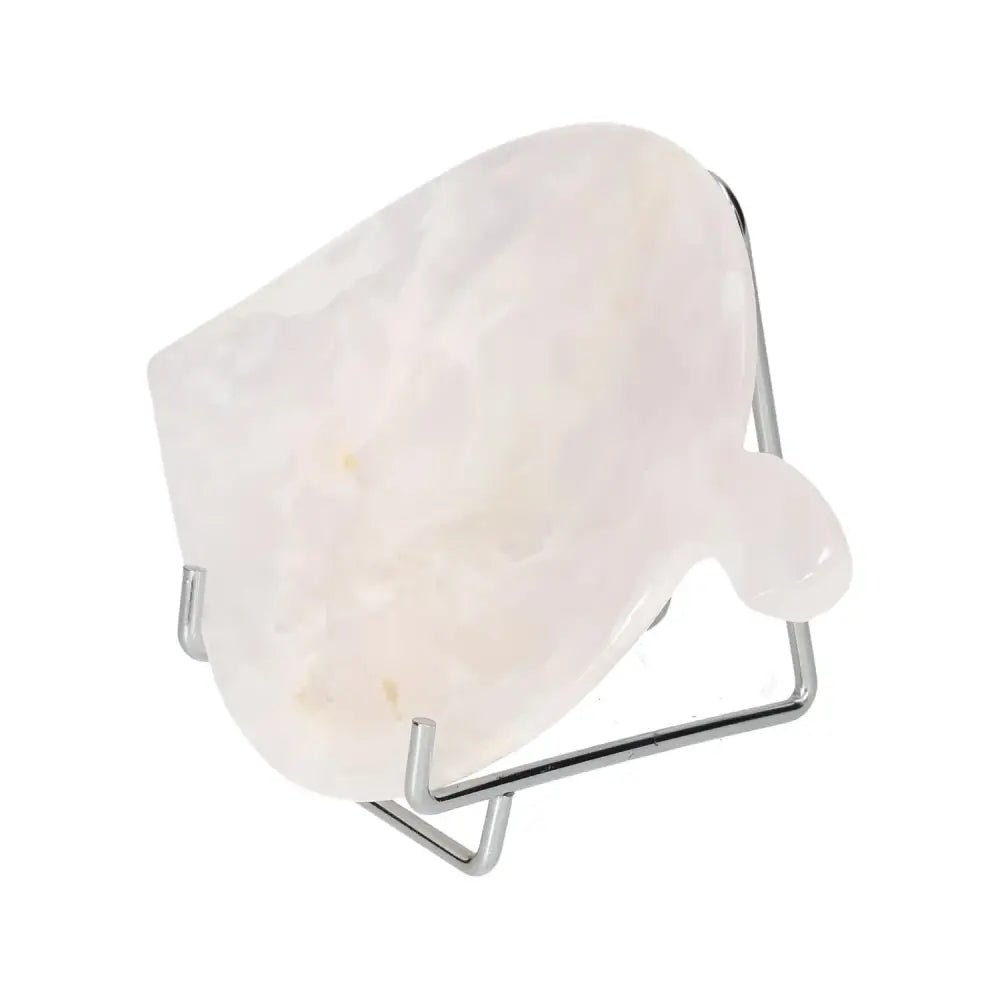 Elegant Rose Onyx Platter on stand, known for fostering self-discipline and empowerment, with a pale pink hue.